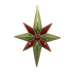 Studio shot of glitter Christmas star ornament, champagne with light green and red