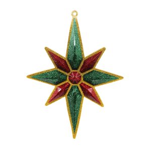 Studio shot of Christmas star ornament, glitter gold with emerald green and red