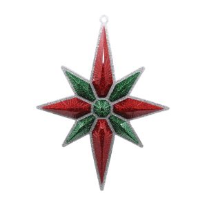 Studio shot glitter Christmas star ornament, red with emerald