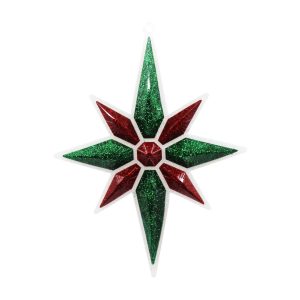 Studio shot of Christmas Star ornament, white with emerald green and red
