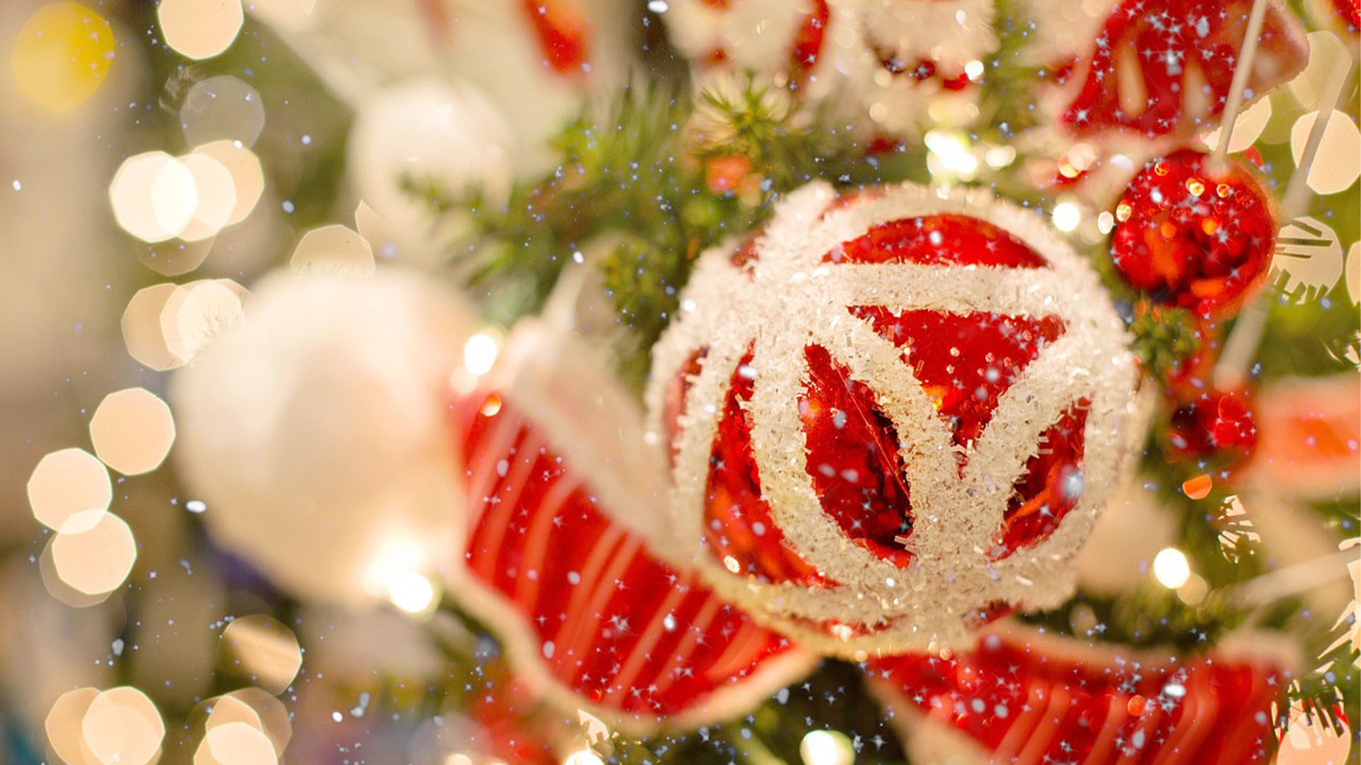 close up of a Christmas tree with red and white Christmas ornaments